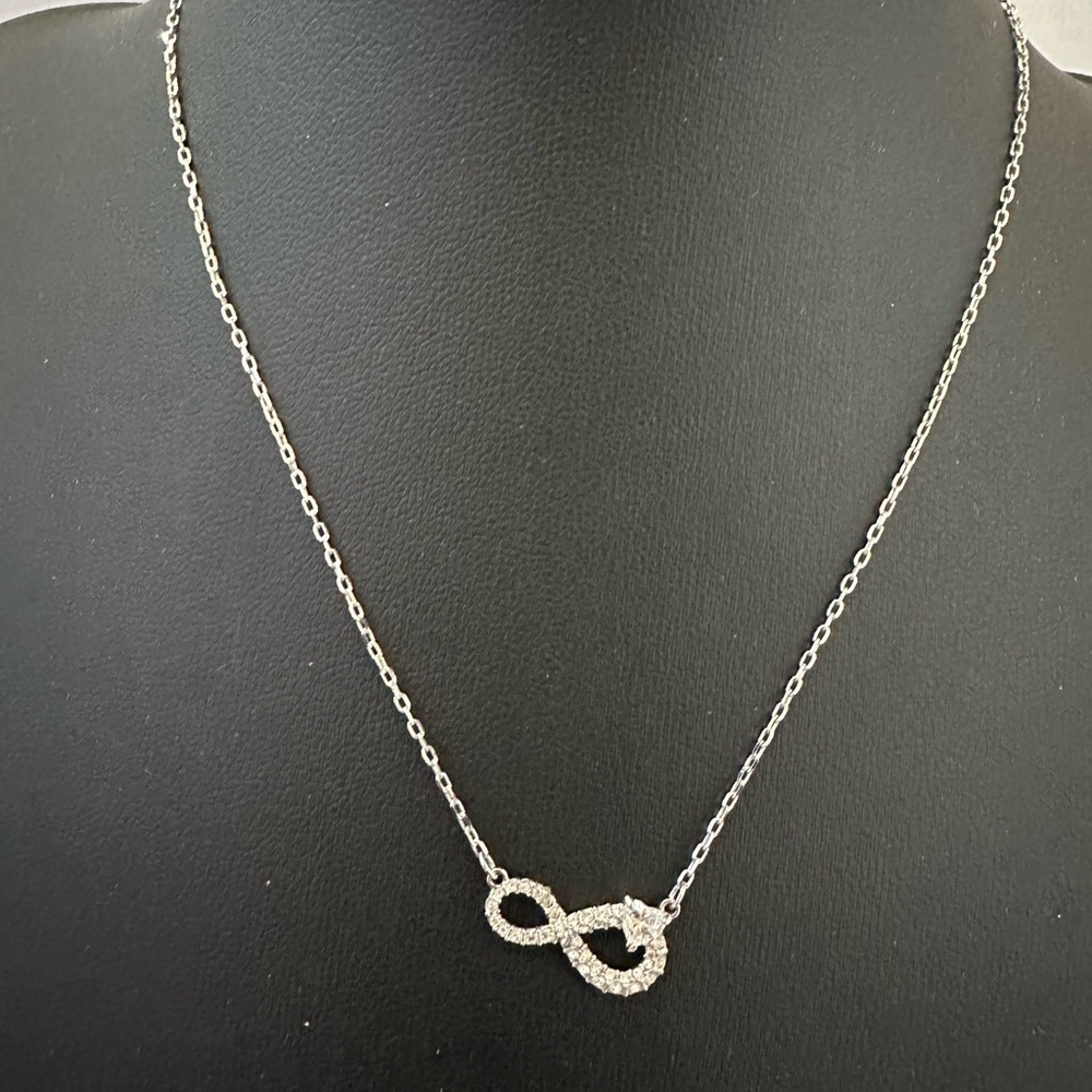 Swarovski silver tone crystal infinity necklace